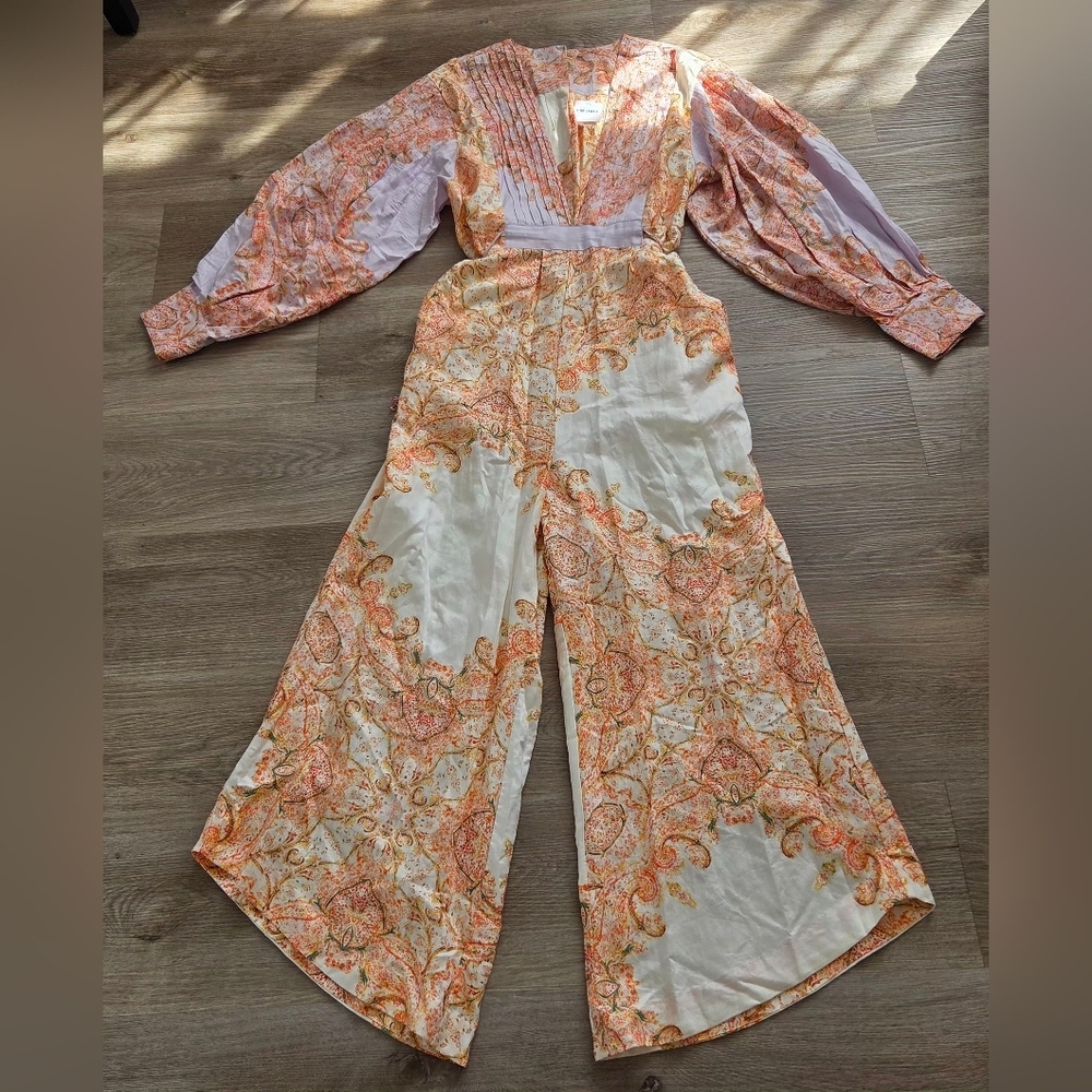 This is a Free People Blooming Fields wide-legged jumpsuit with a paisley bohemi - Picture 3 of 10